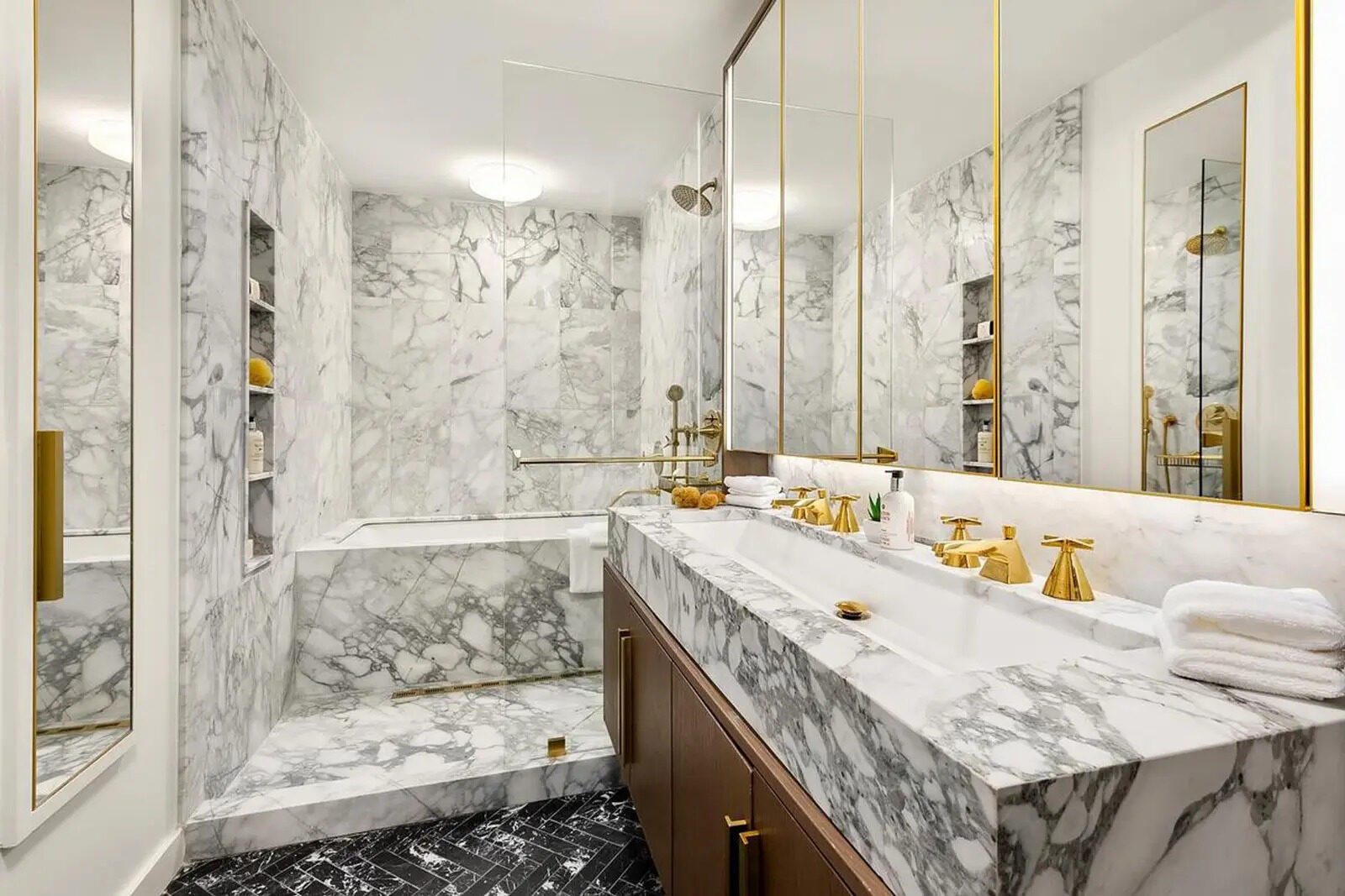Primary bath with a Breccia marble vanity